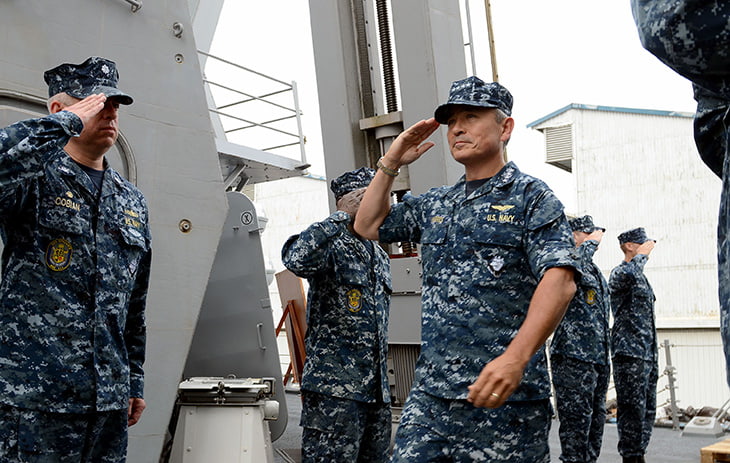 A Navy Admiral visits a military post.